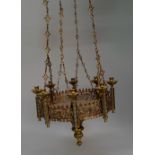 A brass and enamel ecclesiastic eight light chandelier, in the Gothic taste, late 19th/early 20th