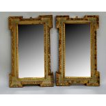 A pair of Italianate parcel gilt and silver frame mirrors, late 18th/early 19th century, with square