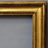 An English Gilt Composition Frame, early 19th century, with cavetto sight, pearl beaded course,