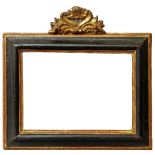 A Spanish Carved, Ebonised and Parcel Gilded Frame, 17th century, with cavetto sight, bolection,