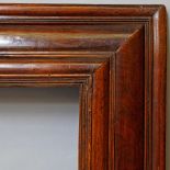 A Dutch Nutwood Bolection Frame, 17th century, with cavetto and reeded sight, reverse ovolo,