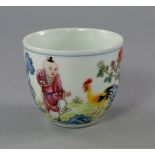 A Chinese Republican tea cup, 20th century, printed and painted with a boy and rooster within formal