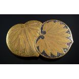 A Japanese lacquer and gilt lid, 19th century, made up of two leaf forms joined, decorated with