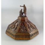 A Italian walnut octagonal font cover, Lombard, late 16th/early 17th century, carved to the top with