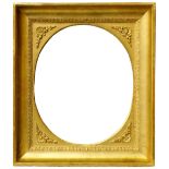 An Italian Gilt Composition Empire Scotia Frame with Oval Aperture, early 19th century,