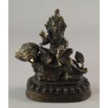 A bronze model of Vaisravana (Jambhala), probably 20th century, moulded sitting on a snow lion,