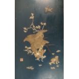 A Japanese lacquer and bone panel, late 19th/20th century, inlaid with a scene of an eagle attaching