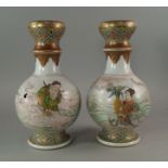 A pair of Japanese satsuma taste bottle vases, late 19th/20th century, gilded and decorated with