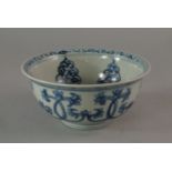 A Chinese blue and white bowl,  Ming, painted with continuous panels of tendrils and flowers, the