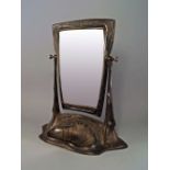 Attributed to J.P Kayser Sohn: A large Art Nouveau pewter dressing table mirror, early 20th century,