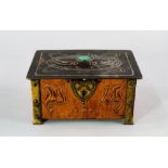 An Art Nouveau copper and brass jewellery box, circa 1910, McVitie & Price, the domed hinged cover