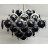 A modern designed ceiling light, 20th century, with a wooden frame,