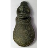 A Taino carved basalt adze with Zemi / Semi head, Pre Columbian, c.1300-1500 A.D. the Zemi being a