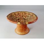 A Cocle painted terracotta pedestal bowl, Panama, c. 600-1200 A.D. Painted in quadripartite sections