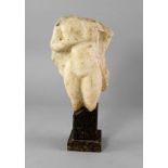 A Roman marble figure of Aphrodite, c. 2nd-3rd century A.D style, from an architectural relief,