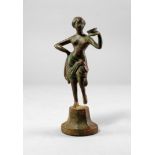 A bronze model of a female in classical pose, modelled in the round, with weight on one leg