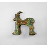 A Bactrian style bronze model of a goat, of stylised form and modelled in the round, 10cm high