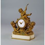 A French ormolu and white marble clock, 19th century, the case mounted with figures playing