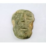 A Pre Columbian Guerrero / Chontal carved green stone mask, late pre-classic / early classic, 300