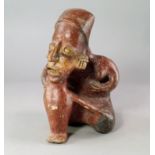 Jalisco seated male figure, Protoclassic, c. 100 B.C. - A.D. 250, modelled in the round, his chin