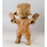 A Veracruz terracotta figure, Remojadas, late Classic, c. 550-950 A.D. the mould-made male in an