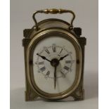 A French metal cased travelling alarm clock, late 19th/early 20th century,
