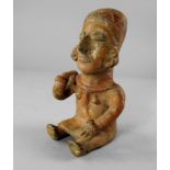 A Pre Columbian style terracotta female effigy figure, of the type from Jama Coaque, Equador,