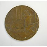 A WWI bronze remembrance plaque awarded to Alfred Taylor,