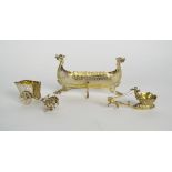 A German 800 standard silver miniature model of a dog drawn embossed cart, being lead by a cherub,