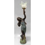 A large patinated metal lamp base, in the form of a woman, late 19th/early 20th century,