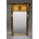 A rectangular gilt wood overmantel mirror, 19th century, with ball applied cresting above central