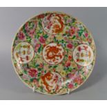 A large Chinese porcelain famille rose medallion dish, Guangxu mark and period, set with five