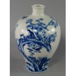 A Chinese porcelain meiping, early 20th century,  painted in underglaze blue with birds perched on a