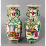 A pair of Chinese Canton porcelain baluster vases, 19th century, each painted in famille rose