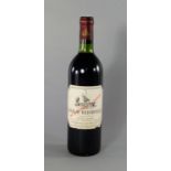 A bottle of Chateau Beychevelle 1982, ullages to bottom neck, slight tear to label,