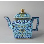 A Chinese cloisonne silver teapot, late 20th century, of square form decorated with archaistic