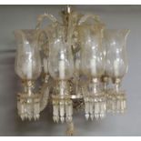 An eight light Baccarat glass chandelier, 20th century, the central pillar with cup form corona,