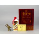 A bottle of Chinese Kweichow Moutai, in  a lacquered presentation box, together with an archaic