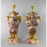 A pair of breche violette marble and gilt metal mounted lamp bases, 20th century, the bodies with