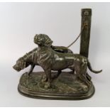 Paul Edouard Delabrierre, French, (1829-1921) a bronze model of two mastiffs chained to a post,