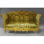 A French gilt framed sofa, circa 1880,