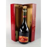 A bottle of Compte Audoin De Dampierre champagne 1998, in a presentation box, ullages to lower neck,