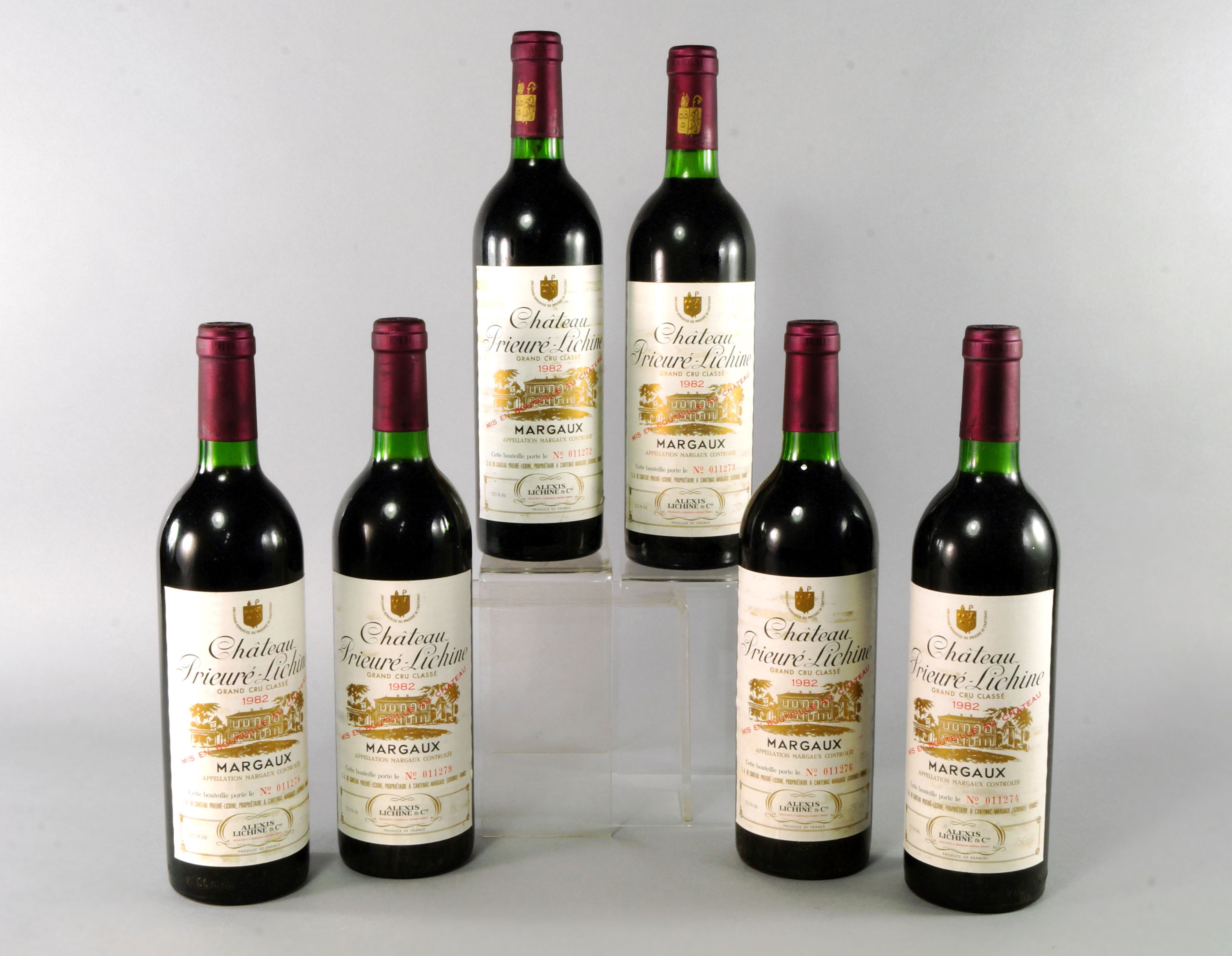 Six bottles of Chateau Prieure Lichine 1982 Grand Cru, ullages to bottom neck,