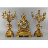 A French gilt metal clock garniture, 20th century, in the Louis XVI taste,