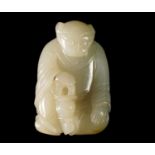 A Chinese pale green jade carved Zodiac figure, early 20th century, modelled as the Zodiac robed