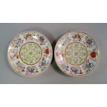 A pair of Chinese porcelain saucer dishes, Guangxu mark and period, painted in famille rose