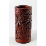 A Chinese bamboo 'three scholars' brush pot, bitong, 17th/18th century, finely carved with three