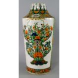 A Chinese porcelain famille verte cylindrical vase, 19th century, set with two panels decorated with