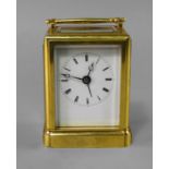 A French brass rectangular carriage clock by Paul Garnier, mid 19th century, with bevelled glass