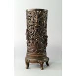 A Chinese bronze cylindrical vase, 19th century, finely cast and pierced with five immortals